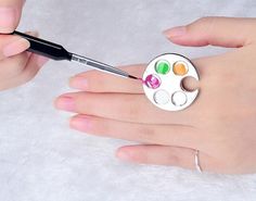 Description:High quality material, durable for long time use.Smooth plate surface, easy to clean, convenient to use.Excellent for mixing foundation and nail art colorsIdeal for both professional use and daily use.Fashion, lightweight and convenient design and cute looking appearance.Nail art color palette ring, make your hands free, more convenient.Do not easy to be rusted, also can be decoration ring for fun.Perfect for personal use or professional nail art use.Color: silverMaterial: stainless Nail Color Palette, Painted Foundation, Makeup Mixing Palette, Nail Printer, Clear Nail Tips, Nail Painting, Art Ring, Professional Nail Art, Simple Nail Art Designs