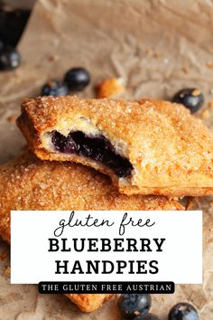 gluten free blueberry hand pies on parchment paper with text overlay