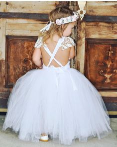 Product Title: Long White Flower Girl Tutu Skirt - Perfect for Weddings, Special Occasions, and Photoshoots Product Description: Let your little one shine with this beautiful long white flower girl tutu skirt, designed to add a touch of magic to any special occasion. Made from layers of soft tulle, this skirt creates a full, flowy silhouette perfect for weddings, birthday parties, or photoshoots. The elastic waistband ensures a comfortable and adjustable fit, making it ideal for growing girls. This elegant flower girl tutu is the perfect complement to any bridal party, blending seamlessly with any dress style or color theme. The lightweight design allows for easy movement, so your flower girl can twirl, dance, and enjoy her big moment with confidence. Features: Made with premium soft tulle White Tutu Skirt, Long Tutu, Girl Tutu Skirt, Tulle Long Skirt, White Tutu, Baby Tutu, Flower Girl Tutu, Tutus For Girls, Tutu Skirt