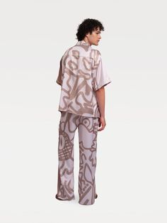 This Package contains men's pajama's top and pants. Crafted from soft, breathable fabric for ultimate comfort. Ensures a peaceful, restful night's sleep. Top showcases a unique patchwork with abstract animal line drawings. Pants designed with a relaxed fit for easy wear. Elastic waistband on pants for added comfort and flexibility. Materials: 52% Viscose, 48% Rayon Care Instructions: Hand Wash Cold This item is not machine washable. Please do not purchase it if you mind. Graffiti Pattern, Mens Pajama Pants, Pyjamas Womens, Mens Pajamas Set, Graffiti Designs, Line Drawings, Pet Shirts, Functional Fashion, Style Savvy