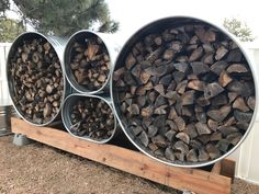 logs stacked on top of each other in buckets