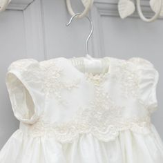 Chloe is a gorgeous 100% silk dupion Christening Gown with delicate ivory and champagne lace overlay on the bodice and sleeves. The neckline is finished with a pretty Venice lace trim and hand beaded with little glass pearl beads. We use only the finest laces and silks available Blessing Gown, Girls Baptism Dress, Baptism Dress Baby Girl, Christening Shoes, Christening Outfit