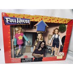 the doll house has two dolls in it