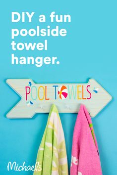 two towels are hanging on a sign that says diy a fun poolside towel hanger