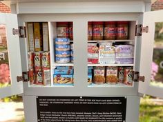 a vending machine with canned food in it