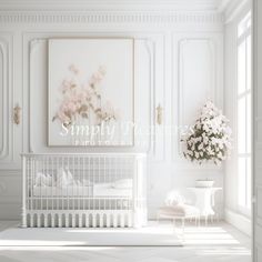 a baby crib in a white room with pink flowers on the wall and framed art