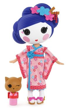 a doll with a cat next to it