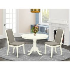 a white table and chairs in a room