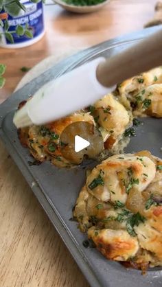 Rachel Kochlin on Instagram: "I can’t get over how good these are! 🙌🏼 🤤 Perfect holiday appetizer! #Ad #WomenOwnedBusiness #OldHomeFoods

Cheesy French Onion Pull Apart Muffins

* 16 oz can refrigerated biscuits
* 5 tbsp butter
* 1 yellow onion, diced
* 1 cup shredded mozzarella
* ½ cup shredded parmesan
* ⅓ cup Old Home French Onion Dip
* 3 garlic cloves, minced
* 3 tbsp parsley, chopped

1. Preheat oven to 375. Grease 12 cup muffin tin (I only use 8).
2. Add 2 tbsp butter and onion to skillet over medium-low heat. Cover and cook until browned, stirring occasionally, about 15 minutes. Turn down the heat if needed.
3. Cut biscuits into 9 pieces and place in bowl. Add mozzarella, parmesan, Old Home french onion dip, garlic, 2 tbsp parsley, and caramelized onion. Toss everything together.