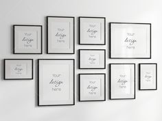 black and white photo frames hanging on the wall