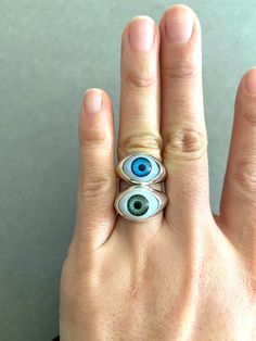 Sterling Silver Eye Rings - Sterling Silver ★ Quantity : One Ring ★ Color : Blue Eye / Green Eye ★ Material : Sterling Silver ★ Ring Size : 5 / 6 / 7 / 8 / 9 / 10 / 11 ★ Band Size : about 6mm wide and 1.5mm thick ★ Eye Size : 15mm*10mm ★ Comes in a jewelry box. If you need extra boxes for gifting....just let us know! Blue Eye Ring, Eyes Ring, Eye Ring Silver, Eye Rings, Eye Green, Rings Sterling Silver, Indie Jewelry, Green Eye, Silver Eye