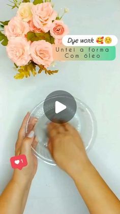 someone is holding a plastic plate with flowers in the background and text that reads due work utila forma com ollea