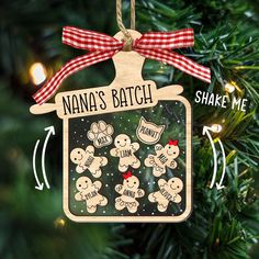 a wooden ornament hanging on a christmas tree that says nana's batch shake me