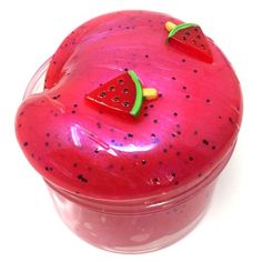 a plastic container with some fruit on it