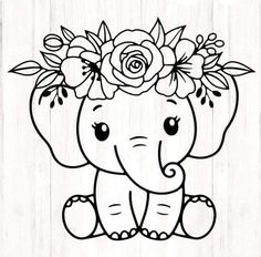 an elephant with flowers on it's head sitting in front of a wooden background