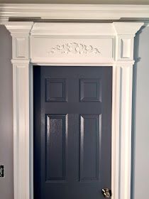 the front door is painted blue and white