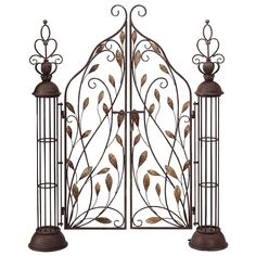 a wrought iron gate with leaves and scrolls on the sides, set against a white background