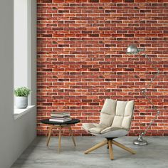 a chair and table in front of a brick wall with a lamp on the side