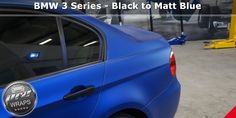 the back end of a blue car parked in front of a building with text reading bmw 3 series - black to matt blue