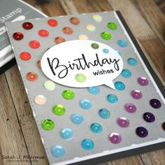 a handmade birthday card with lots of colorful dots on it and the words happy birthday written in a speech bubble