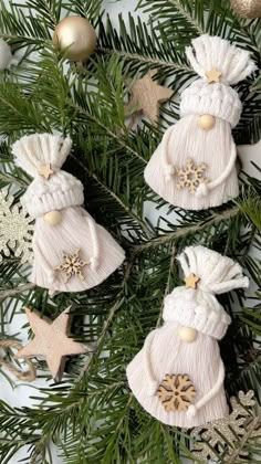 some ornaments are hanging from a christmas tree