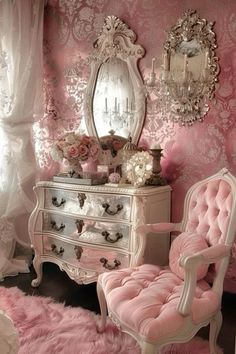 a bedroom with pink and white furniture and walls covered in damask wallpapers