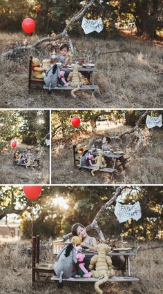 two people sitting on a bench with stuffed animals and balloons in the air above them