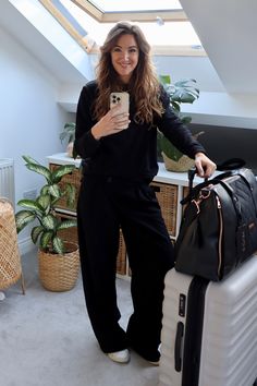 7 Stylish airplane outfits + inspo for comfy women’s travel outfits - The Travel Hack Airport Outfits For Long Flights, Nike Travel Outfit, Athleta Travel Outfits, Flight Attire Outfits, Comfortable Airplane Outfit, Travel Outfit Ideas For Women Over 40, Travel Leisure Outfits, Comfy Airplane Outfit Long Flights, Comfy Plane Outfit