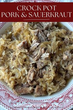 crock pot pork and sauerkraut on a red and white plate