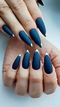 Elevate your nail game with this chic matte navy design featuring elegant gold tips! The sharp, elongated shape adds a touch of sophistication, perfect for any occasion. Ideal for those who love bold and stylish nail art, this look combines modern elegance with a hint of glamour. Try it for your next night out or special event! #NailArt #MatteNails #NailDesignInspiration #fallnails #septembernails Wedding Nails For Navy Blue Dress, Matte Navy And Gold Nails, Matt Navy Nails, Classy Navy Nails, October Vacation Nails, Blue Beige Nails, Nail Art Designs Navy Blue, Red And Navy Nails, Nails With Navy Dress