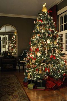 a decorated christmas tree in a living room