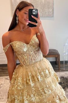 Make an unforgettable entrance in this eye-catching off-the-shoulder gold-sequin ruffle multi-layer long gown. Featuring exquisite gold-sequin lace, a deftly crafted lace-up back, and multiple layers of tulle for a luxurious effect, this showstopping dress is the perfect choice for any special occasion. Be the belle of the ball!

SKU: MD0575
Tulle Fabric
Floor Length
Size: US 0-26 W. Check our Size Chart to get your correct size. 
Recommend custom size for plus size.
Free custom size service is available. Email your exact measurements once order is placed. 
Fully lined & Built with bra
Processing time: 10-15 business days. 
If you want to speed up your dress processing time, please put in the link of rush order fee into your shopping cart to check out with the item you want. And email us t Glamorous Gold Strapless Gown, Gold Off-shoulder Wedding Dress, Gold Off-shoulder Gown For Wedding, Gold Strapless Gown For Prom Season, Gold Off-shoulder Prom Dress, Gold Strapless Gown For Gala, Gold Off-shoulder Dress For Prom Season, Gold Off-shoulder Dress For Prom, Glamorous Gold Evening Dress With Sweetheart Neckline