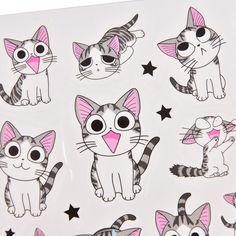 a sticker sheet with cartoon cats and stars on it's side, all in different shapes and sizes