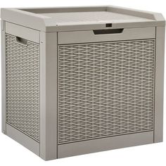 an outdoor wicker storage box with lid and handles on the front, side view