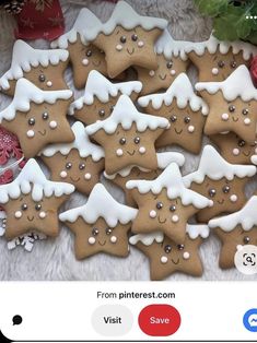 a pile of decorated cookies sitting on top of a table