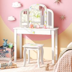 a white vanity table with a mirror and stool