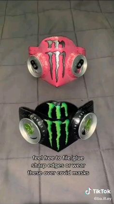 two monster trucks with neon green and pink paint on them, one has the words'feel free to fatigue sharp edges or wear three over oval masks