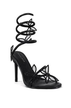 These Dancy-Black Flower Wrap Stiletto Sandals feature black open-toe heels with crystal-embellished wrap-up cords. The butterfly accents add a touch of elegance and an eye-catching twist to these heels. Heel Height: 4.25" Hoco Heels, Homecoming Heels, Black Heels Prom, Prom Shoes Black, Black Sparkly Heels, Black Glitter Heels, Cute Black Heels, Wrap Around Heels, Butterfly Heels