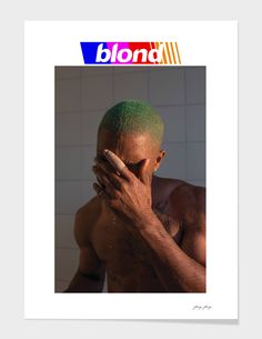 a man with green hair covering his face