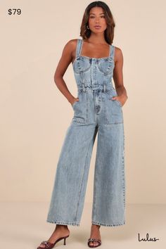 From street style to weekend style, we can't get enough of the Lulus Confirmed Trendsetter Light Wash Denim Bustier Jumpsuit! Sturdy cotton denim, with a subtle acid-washed effect, shapes this enviably cool jumpsuit that has wide straps (with internal, adjustable back buttons) that support a bustier bodice with seamed cups and a sweetheart neckline. Hidden functional snap button placket secures the front, continuing down to a banded waist with belt loops and a hidden zip fly. Wide pant legs feat