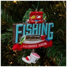 a fishing ornament hanging from a christmas tree