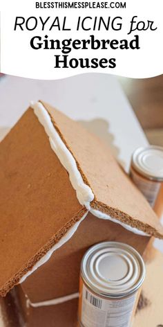 the gingerbread house is made out of cardboard and has white icing on it