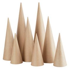 small wooden cones are lined up in a row