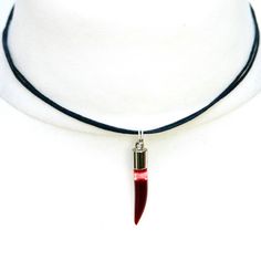 Blood filled glass vampire vial necklace in the shape of a fang.  Perfect gift idea and accessory for vampires, witches and goths!  Looks gorgeous on. - Comes on an adjustable cord choker with sliding knots to fit any size - Vial approximately 35mm long Silver necklace version available here:  https://www.etsy.com/uk/listing/233525924 Grossed out? Don't worry, although the fluid inside is thick and dark red, perfectly resembling blood, it is made with fake blood. :) Please note, the vial is seal Blood Vial Necklace, Glitter Perfume, Cord Choker, Matching Jewellery, Vial Necklace, Long Silver Necklace, Glass Vials, Matching Jewelry, Necklace Black