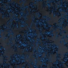 a black and blue fabric with flowers on the top, it looks like something out of space