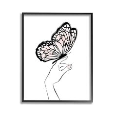 a black and white drawing of a hand holding a butterfly