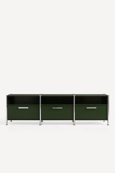 three green drawers sitting next to each other