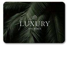 the luxury spa robes logo is shown on a black and white background with palm leaves