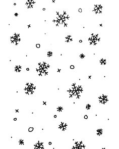 black and white snowflakes are flying through the air