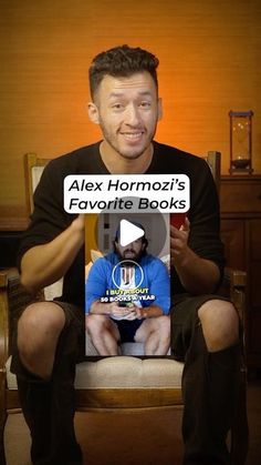 a man sitting in a chair holding a book with the caption alex hormozi's favorite books